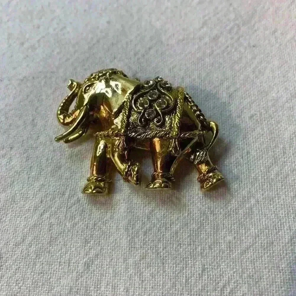 Vintage elephant, brooch, gold with bezel set rhinestones